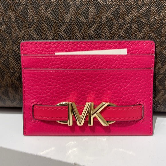 MICHAEL KORS
Reed Large Pebbled Leather Card Holder Case
Electric Pink 
NWT - Picture 9 of 16